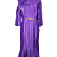 Purple dress on a mannequin with a white background