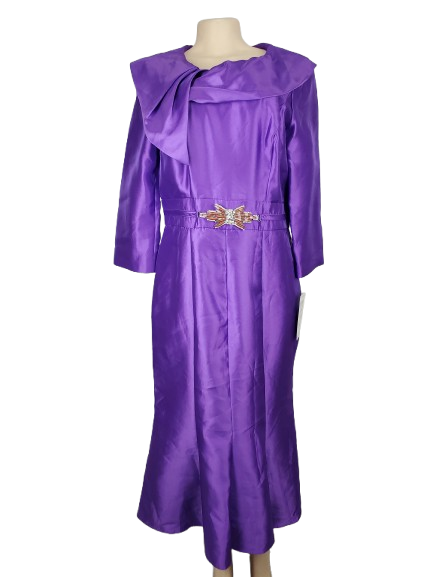 Purple dress on a mannequin with a white background