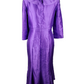 Purple dress on a mannequin against a white background