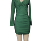 Green long sleeve bodycon mini dress with ruched detailing and sweetheart neckline