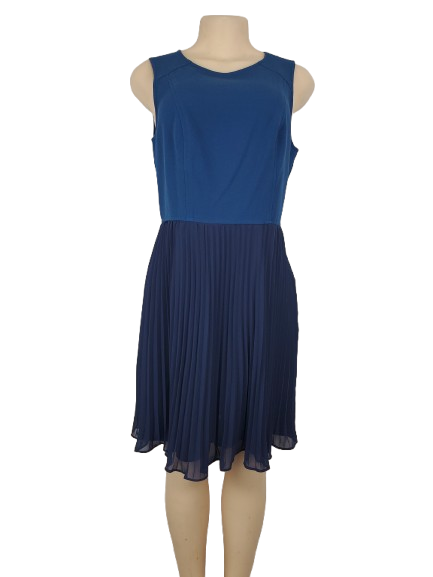 Blue dress on a mannequin against a white background