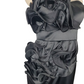 black strapless dress with ruffled top on a mannequin against a white background