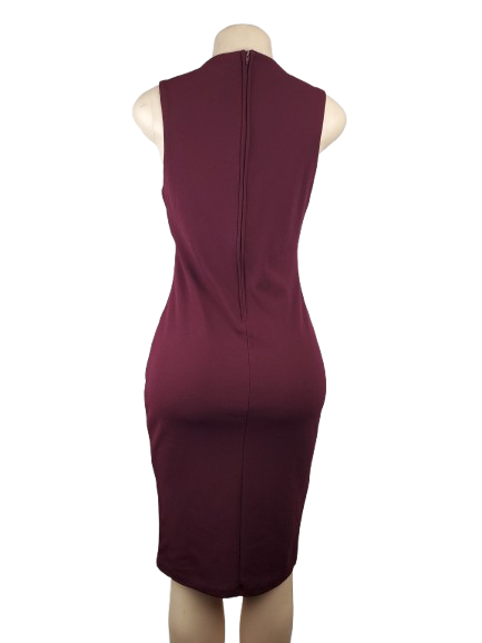 Maroon dress on a mannequin against a white background