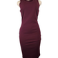 Maroon dress on a mannequin against a white background