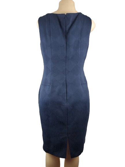 Blue dress on a mannequin against a white background