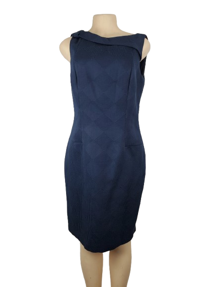 Navy blue dress on a mannequin against a white background
