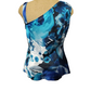 One-shoulder floral dress with blue and black pattern on a mannequin against a white background