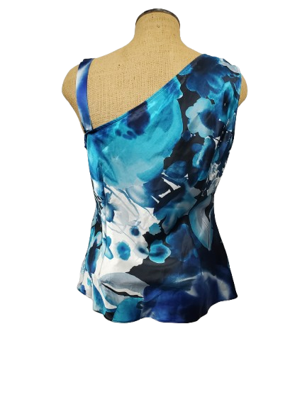 One-shoulder floral dress with blue and black pattern on a mannequin against a white background
