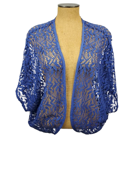 Blue lace shrug on a mannequin against a white background
