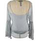 Gray blouse with sheer sleeves on a mannequin against a white background