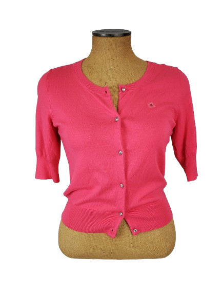 Pink women’s button front short sleeve cardigan sweater displayed on mannequin.