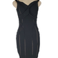 Black dress on a mannequin against a white background