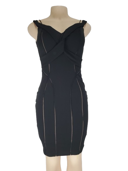 Black dress on a mannequin against a white background