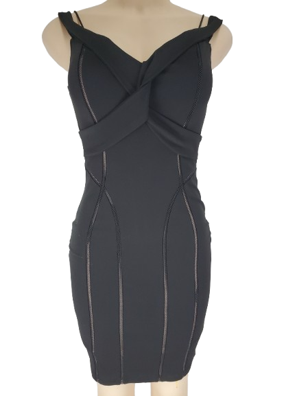 Black dress on a mannequin against a white background