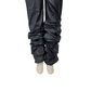Black rain pants on a white background