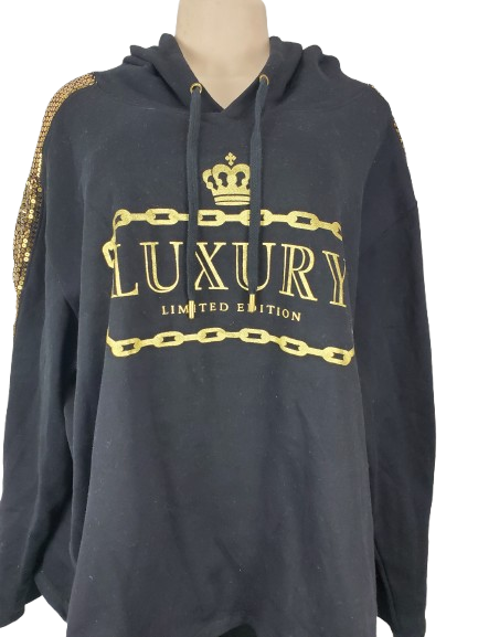 Black hoodie with gold chain design and 'Luxury Limited Edition' text on a mannequin.