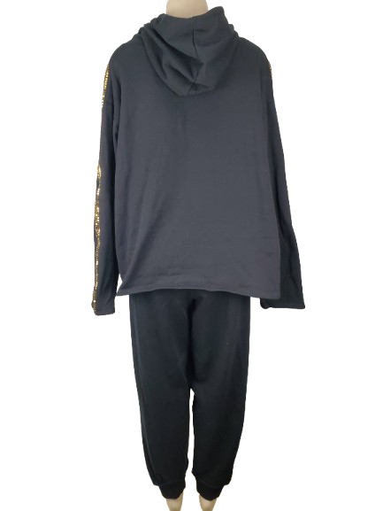 black hoodie and black pants on a mannequin against a white background