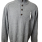 Gray sweater with buttons on a mannequin against a white background