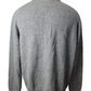 Gray sweater on a mannequin against a white background