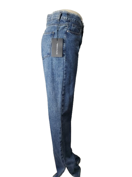 Blue jeans with a tag on a white background