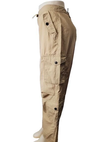 Beige pants with multiple pockets on a white background