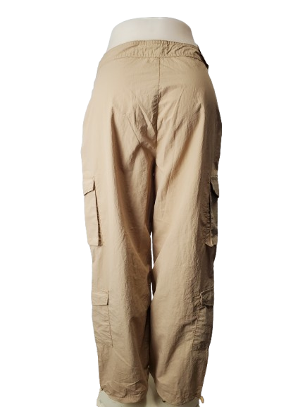 Beige cargo pants on a white background