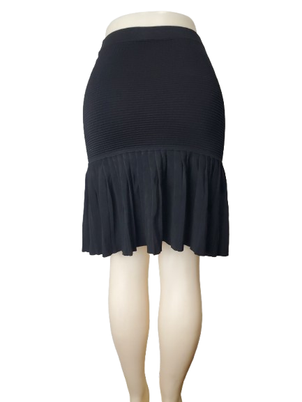 Black skirt with ruffled bottom on a mannequin against a white background