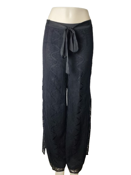 Black lace pants on a mannequin against a white background