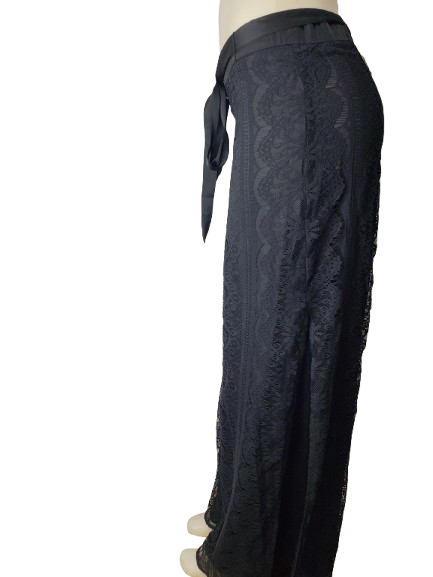 Black lace pants on a mannequin against a white background