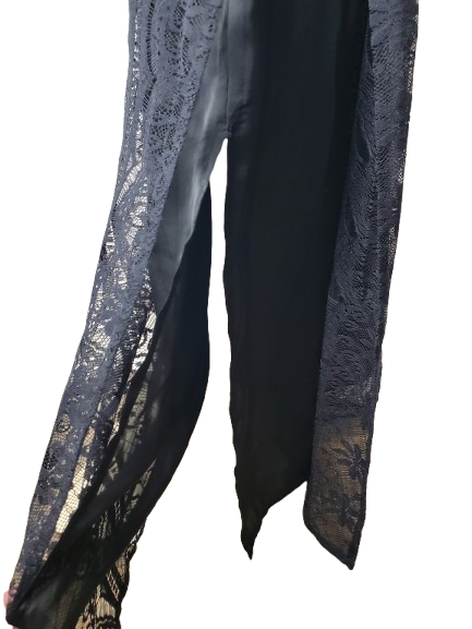 Black scarf with lace detailing on a white background