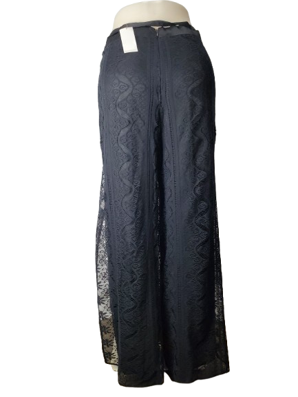 black pants with lace detailing on a white background