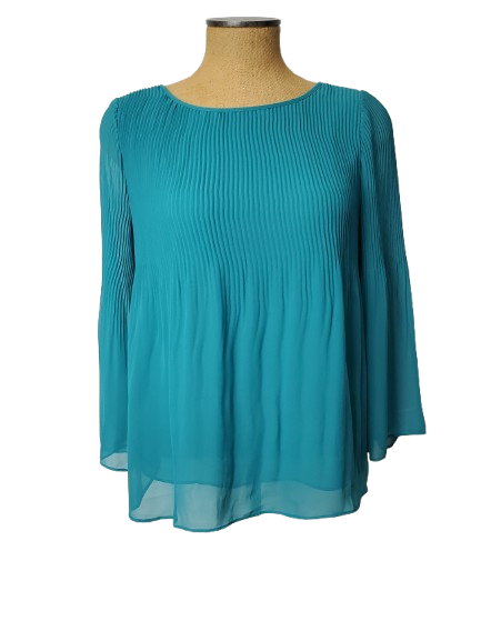 Teal blouse on a mannequin against a white background