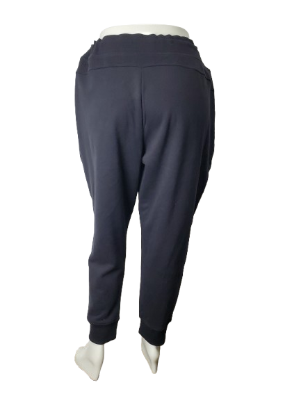 black jogger pants on a mannequin against a white background