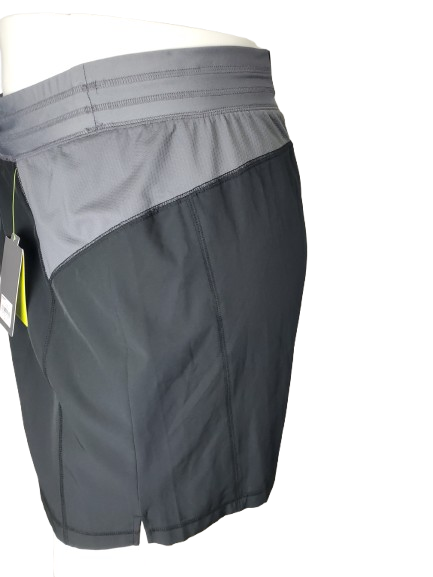Gray athletic shorts on a mannequin with a white background