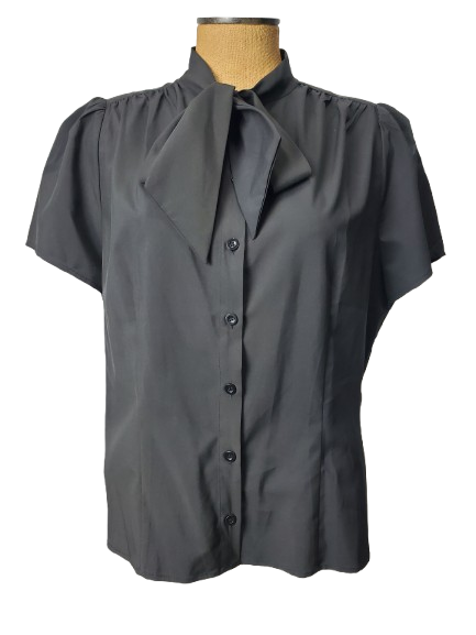 black blouse on a mannequin against a white background