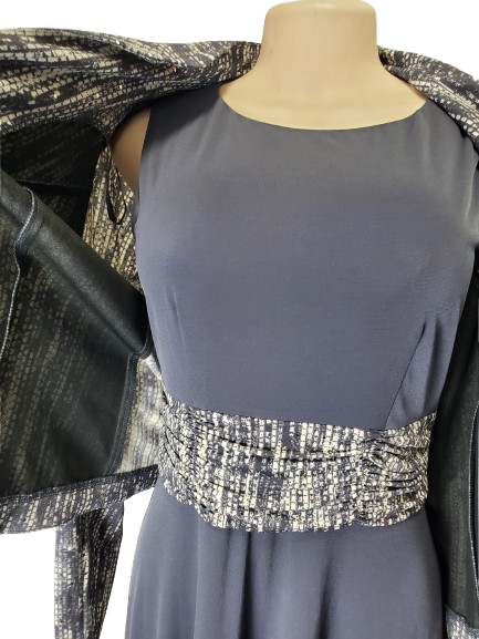 Mannequin wearing a gray dress with a decorative waistband on a white background