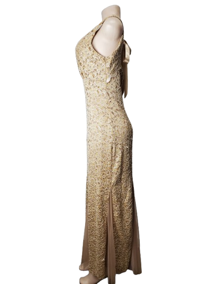 Beige halter neck dress on a mannequin against a white background