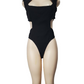 Black bodysuit on a mannequin against a white background
