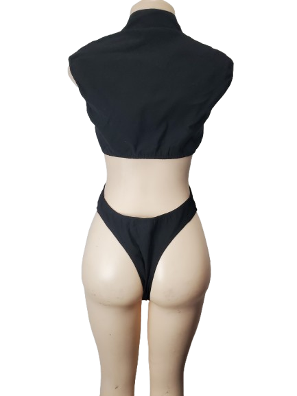 Mannequin wearing a black sleeveless top and high-waisted black bodysuit on a white background