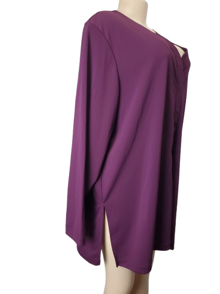 Purple blouse on a mannequin against a white background