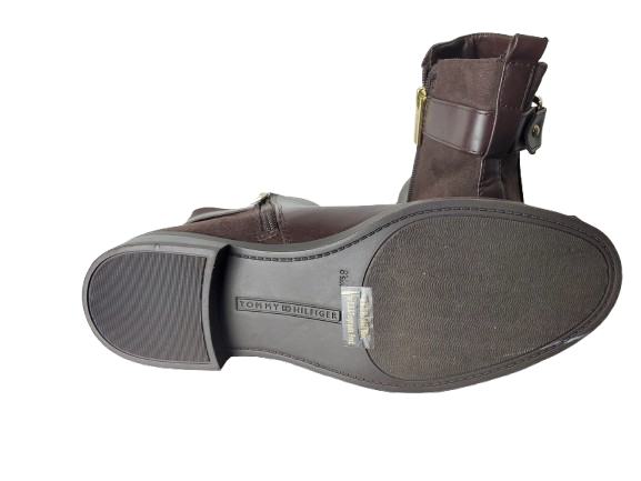 Brown boot with visible brand name on a white background