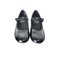 Black shoes with transparent soles on a white background