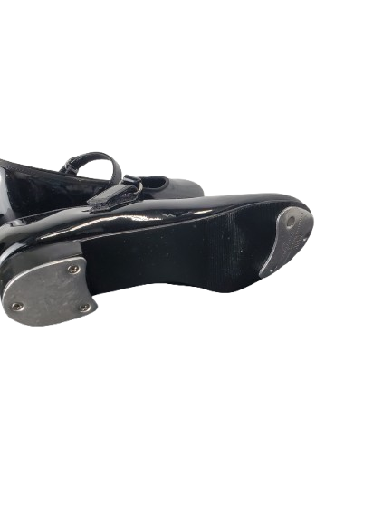 Black tap shoe on a white background