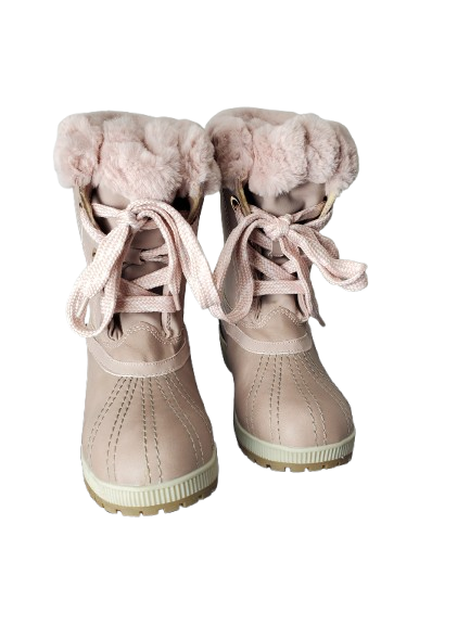 Pair of pink winter boots with fur trim on a white background