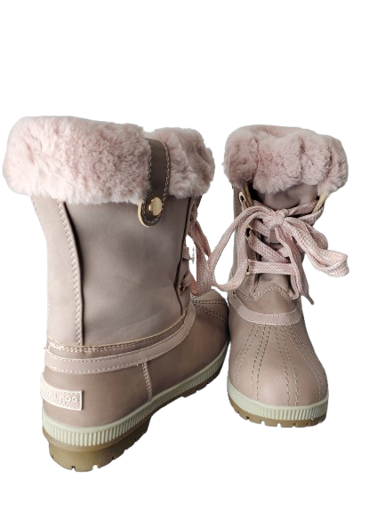 Pair of blush winter boots with fur-lined tops on a white background