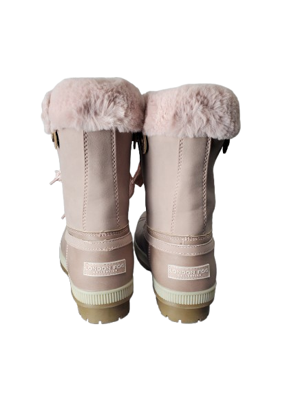 Pair of pink winter boots with fur trim on a white background