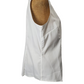 White sleeveless top on a mannequin with a white background