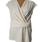 Beige wrap-style top on a mannequin against a white background