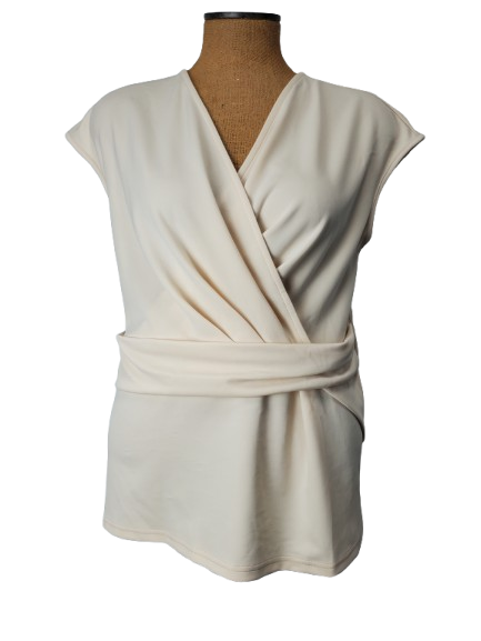 Beige wrap-style top on a mannequin against a white background