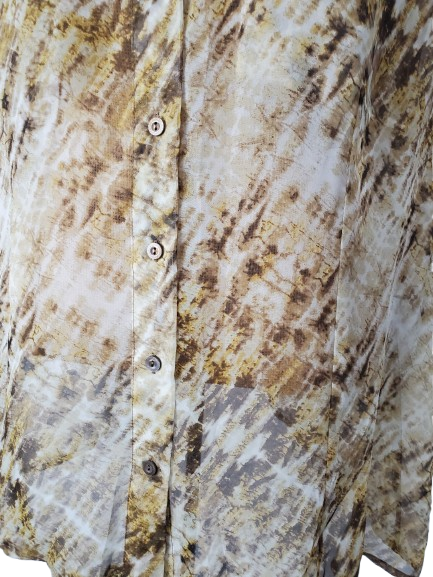 Close-up of a patterned shirt with a focus on texture and color.